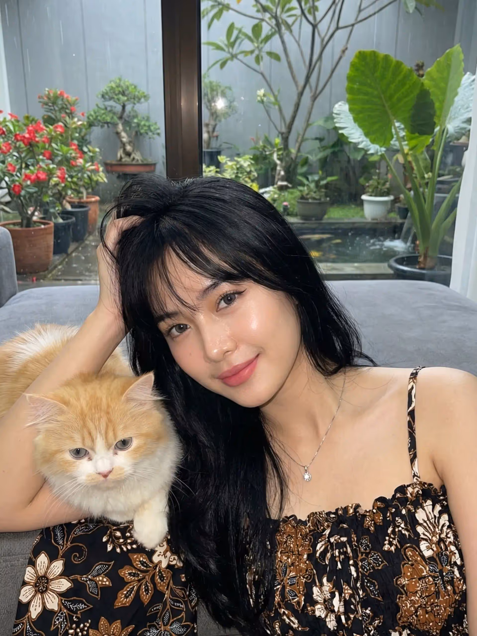 Ultra Realistic Portrait of Girl with Angora Cat on Sofa